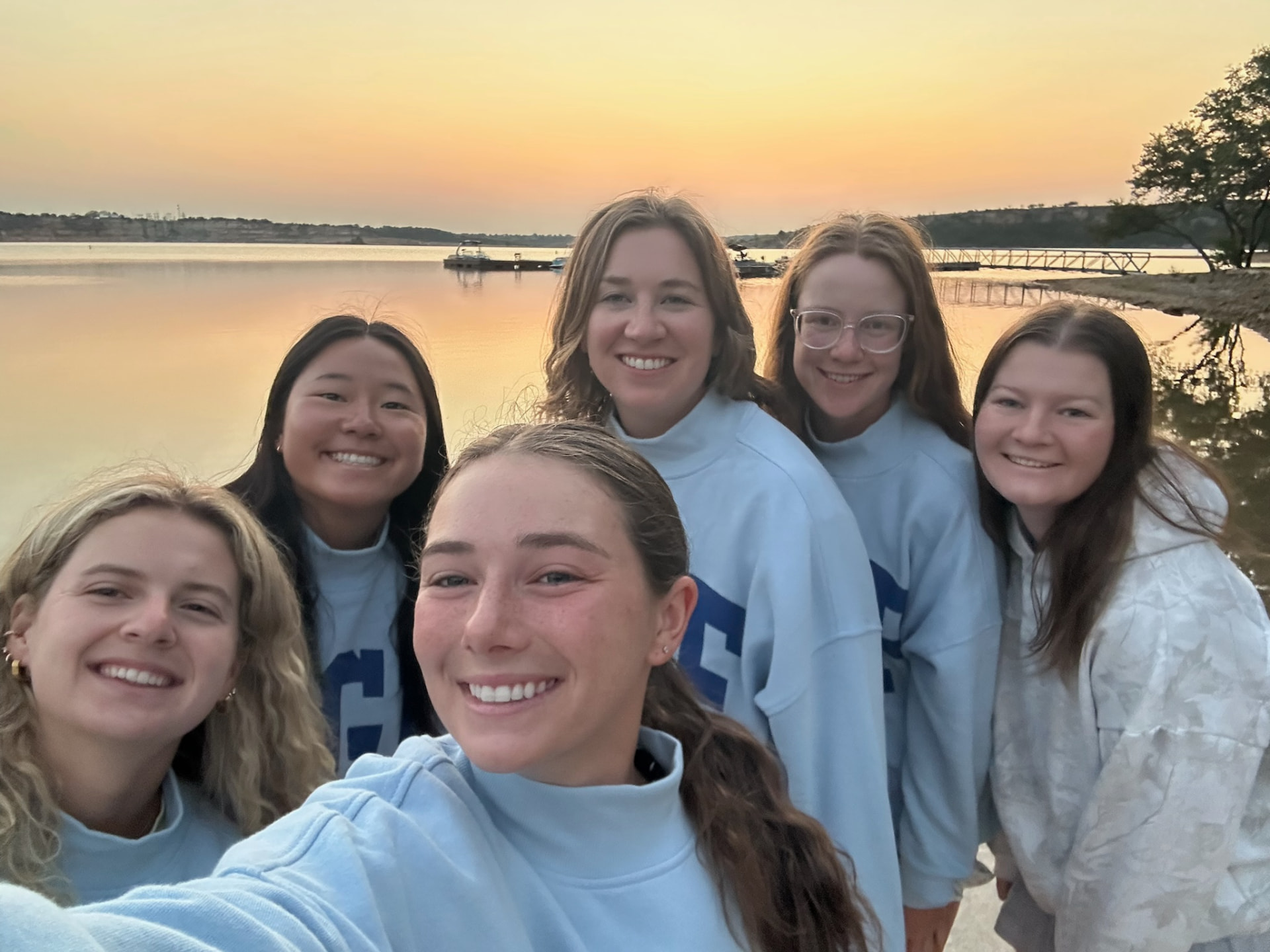 WGF women together at sunset at a retreat